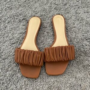 Reformation ruched slide sandal. Lightly worn, great condition.